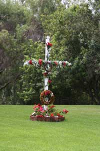 Cross in lawn.